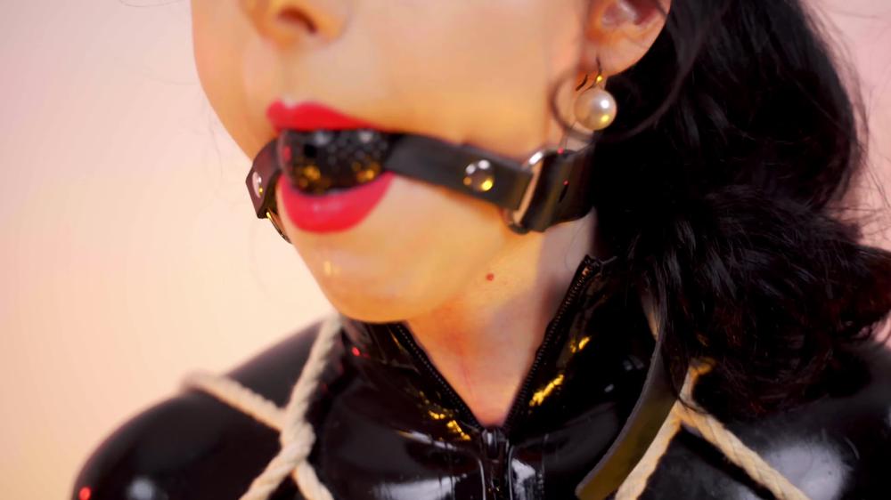Rope Bondage In Black Latex Catsuit