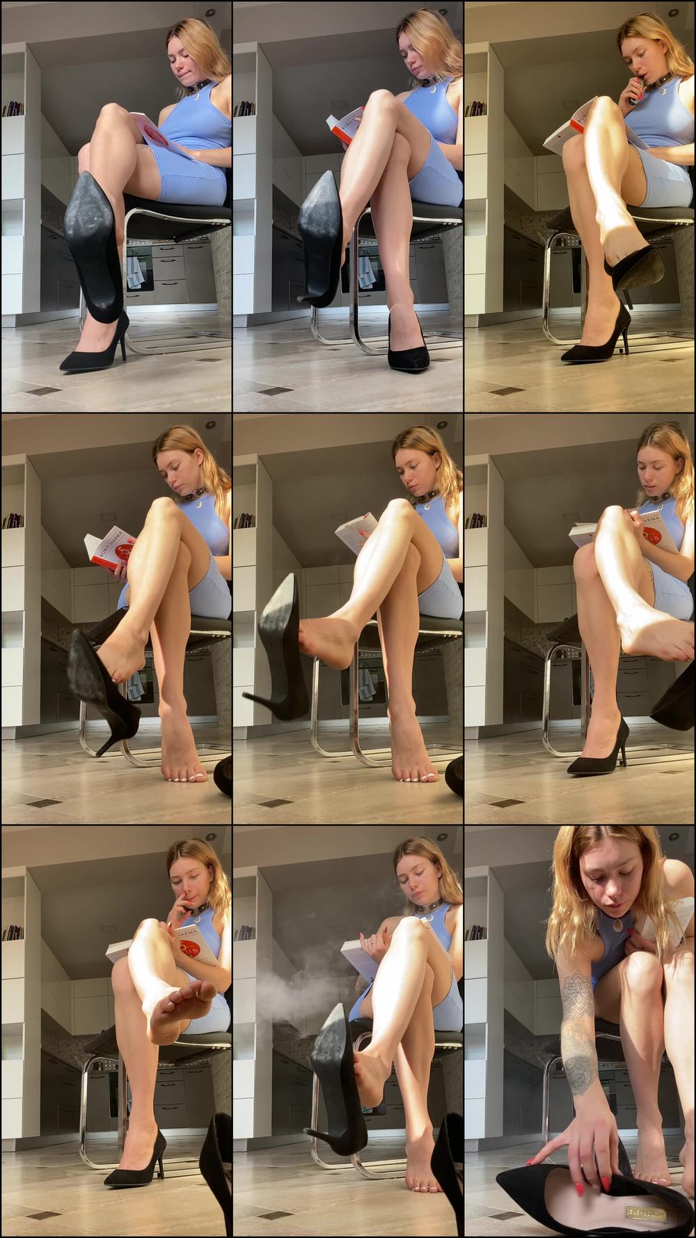 reading book while ignoring little slave