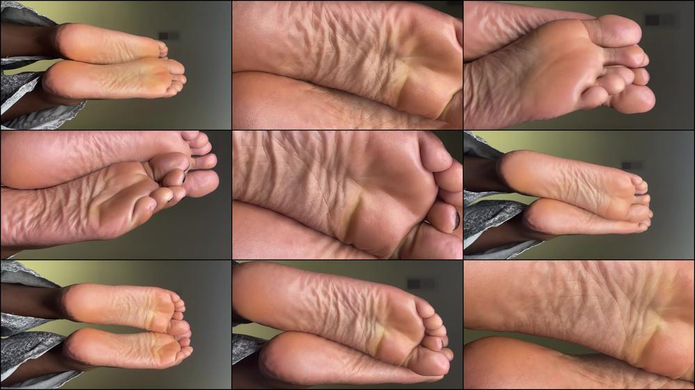 Ebony Girl Relaxes On Couch With Feet Up