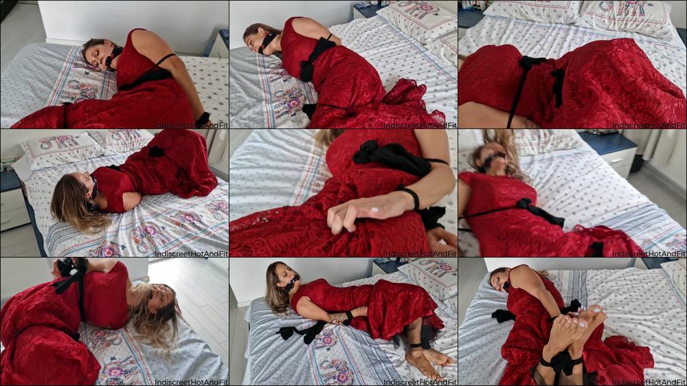 Lady in red, bound and gagged