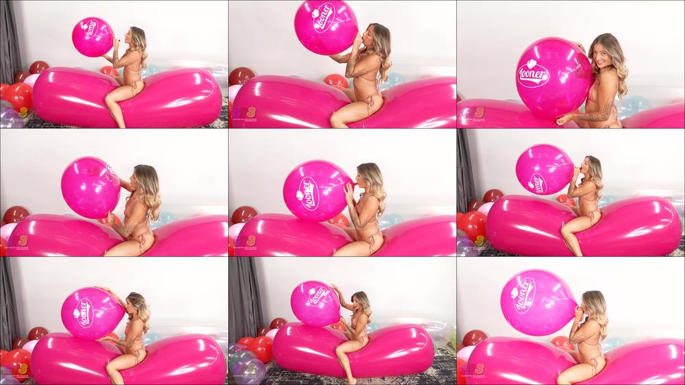 Chelsea Blow Pops Sitting on Inflatable