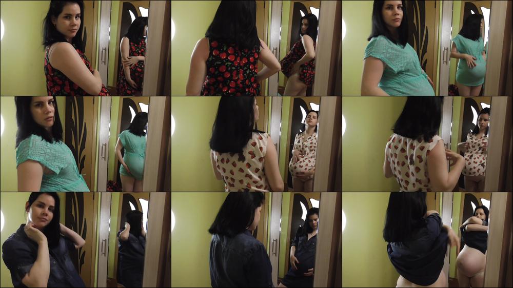 Pregnant Beauty Trying On Dresses