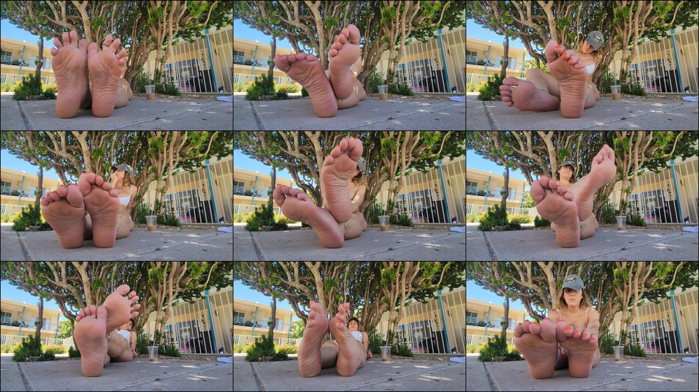 Barefoot Soles Outside In The Sun