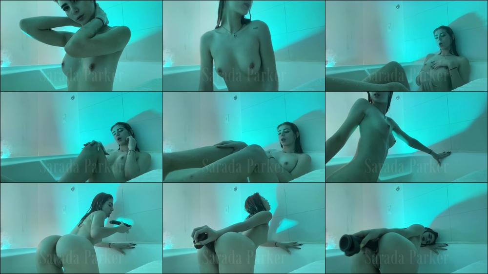 Doggystyle in bathtub with a black dildo