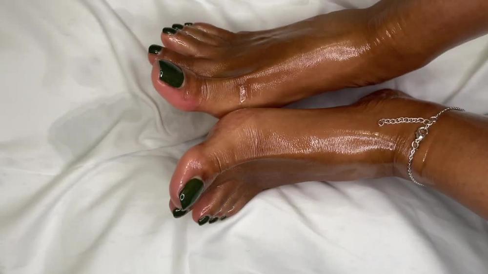 Ebony Girl Pours Oil All Over Her Feet