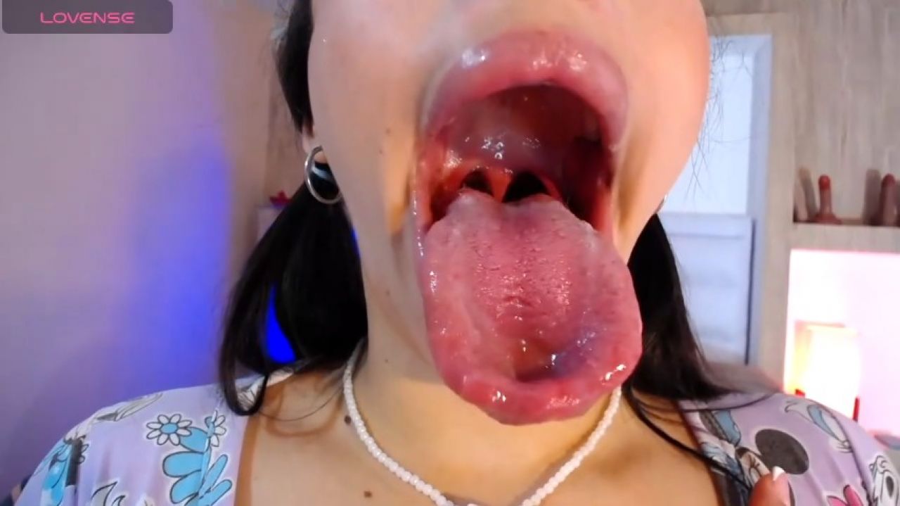 Lustful Licking of Shiny, Wet Dildo
