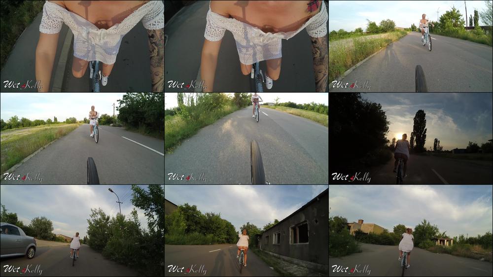 Wet Kelly Riding My Bicycle And Flashing