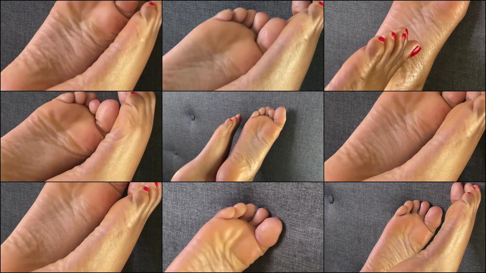 Ebony Girl Rubs Feet Together