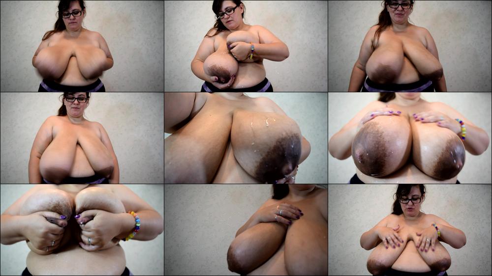 squirt milk from 1 boob on another boob